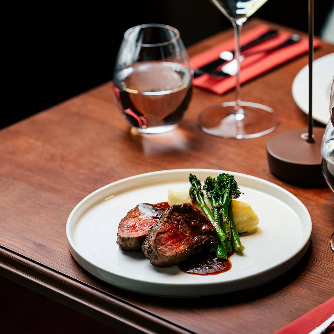 A piano bar restaurant where dinner becomes part of the night.