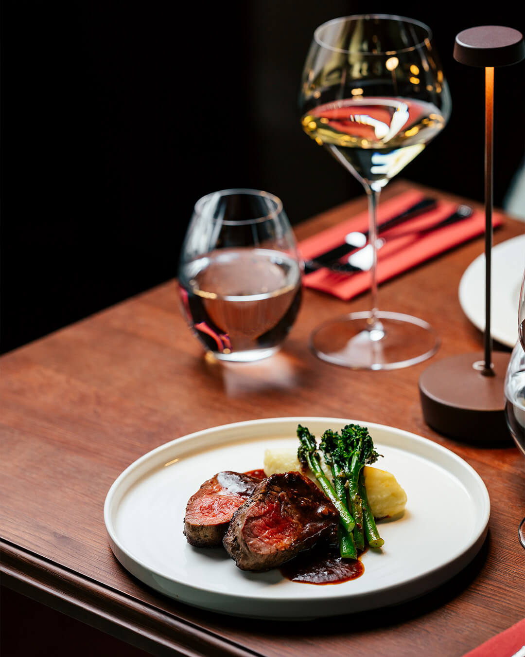 A piano bar restaurant where dinner becomes part of the night.