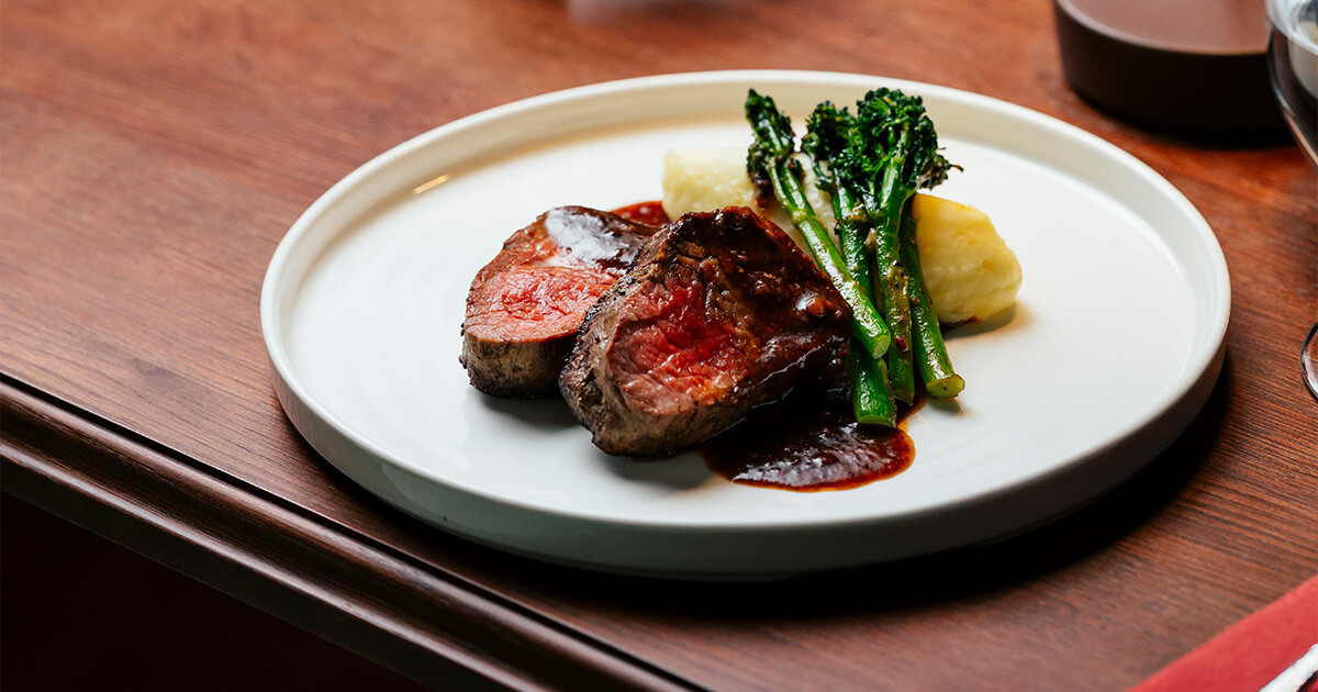 A piano bar restaurant where dinner becomes part of the night.