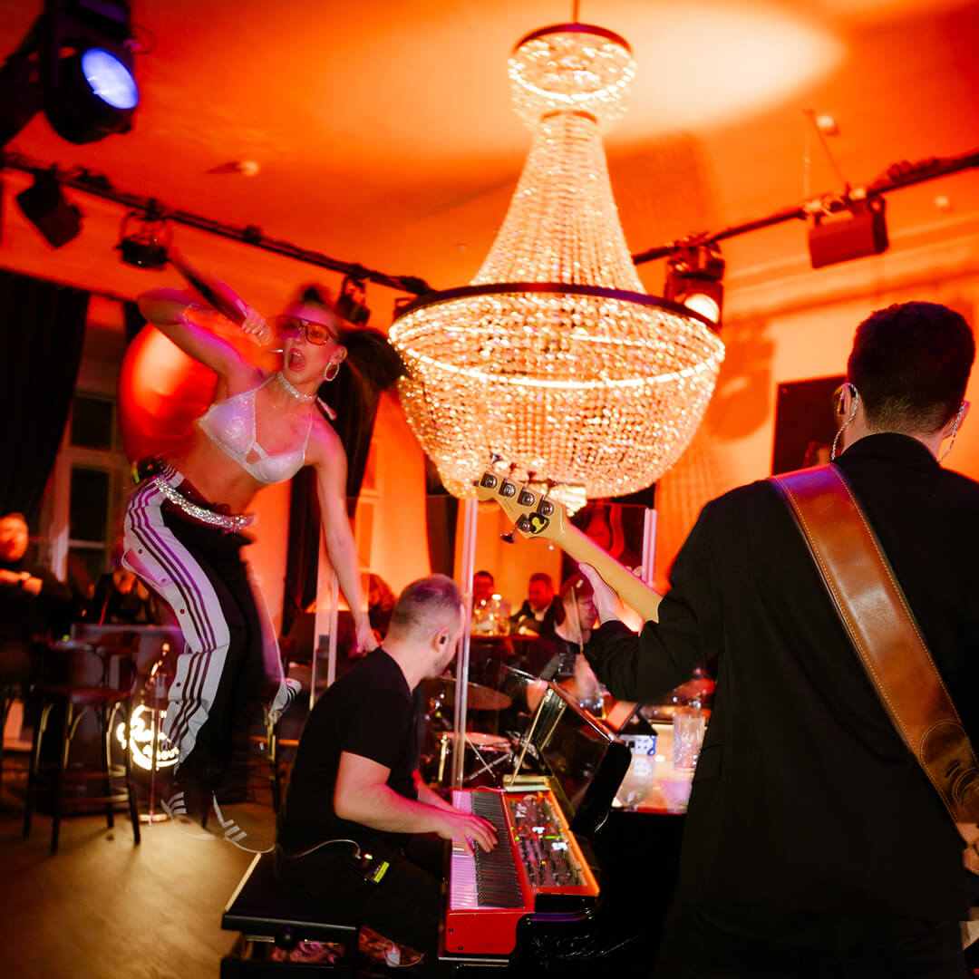 Stage with live singers and piano at The Piano Bar Prague