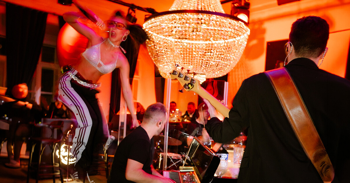 Stage with live singers and piano at The Piano Bar Prague